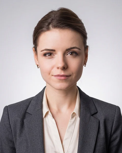 Example AI profile photo: Grey gradient · suit, women’s cut