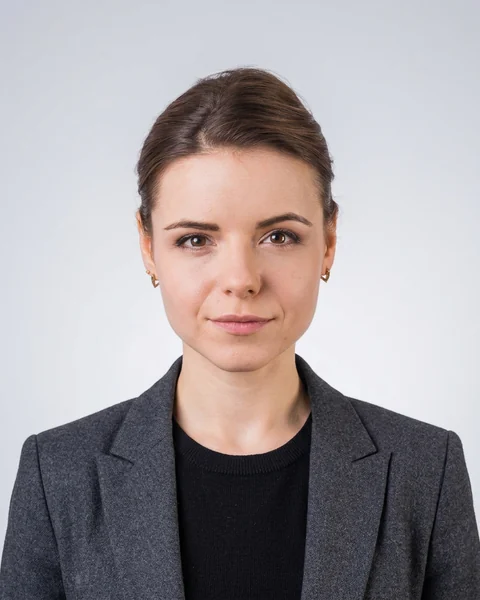 Example AI profile photo: Grey gradient · smart casual, women’s cut